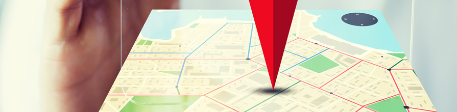 A red triangle pointing to a place on a phone's map
