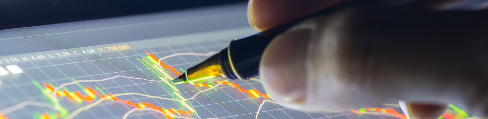 Financial analysis graphs on an electronic tablet