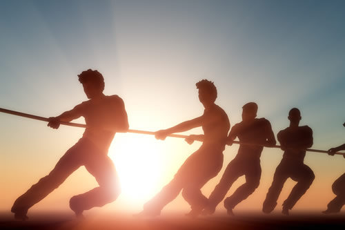 Teamwork in a tug of war