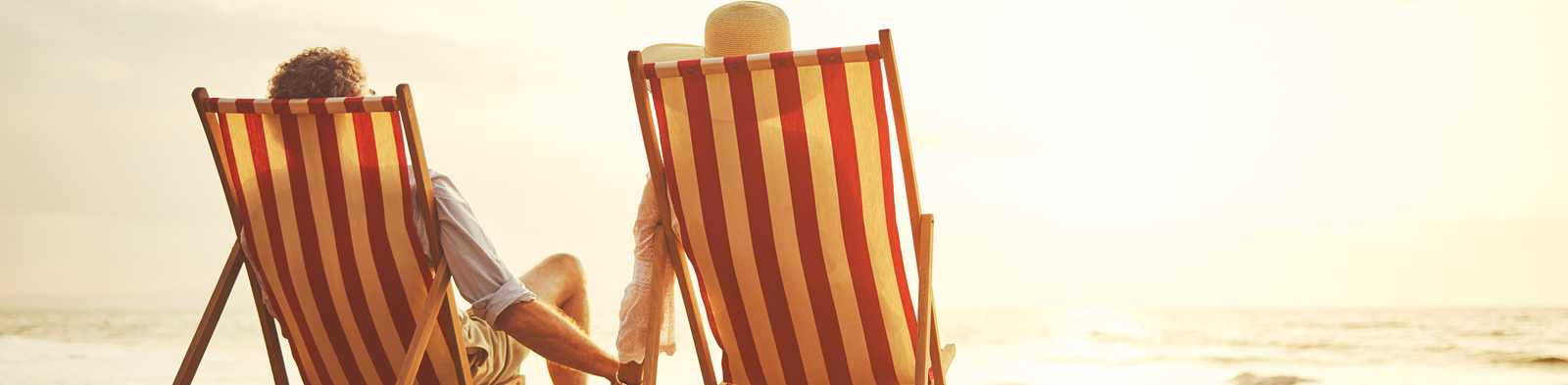Retired couple enjoying the beach