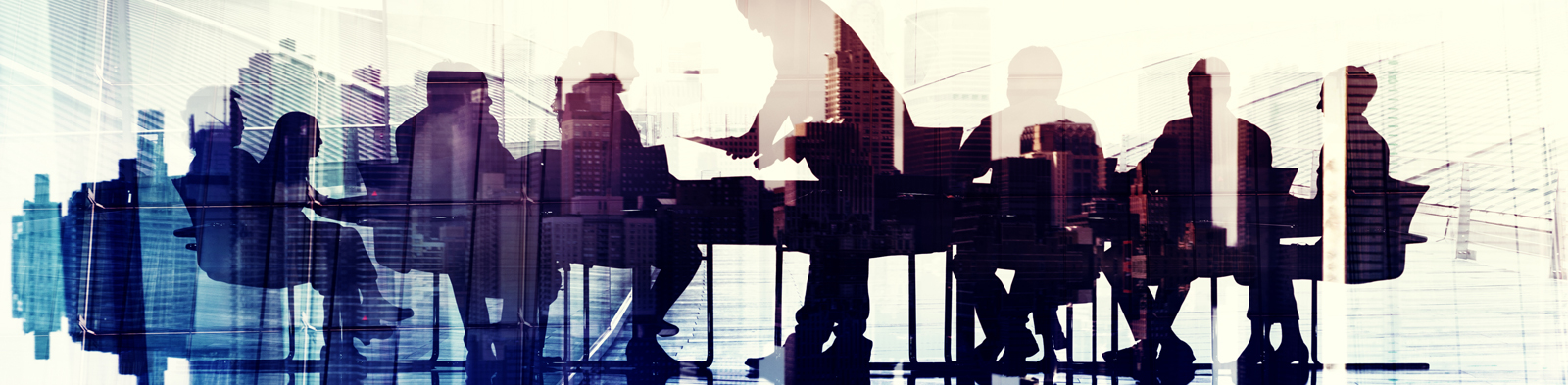 Abstract Image of Business People's Silhouettes in a Meeting