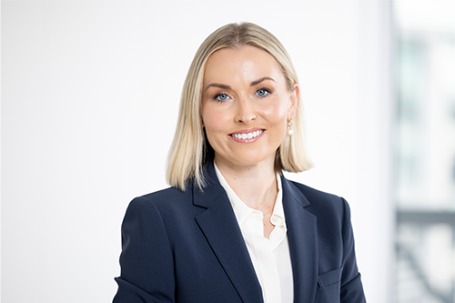 Headshot photo of Julia against a white background