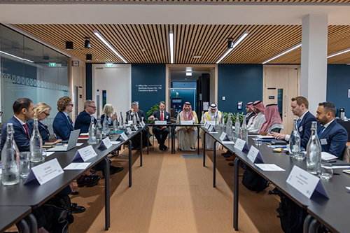The delegation sat around a table.