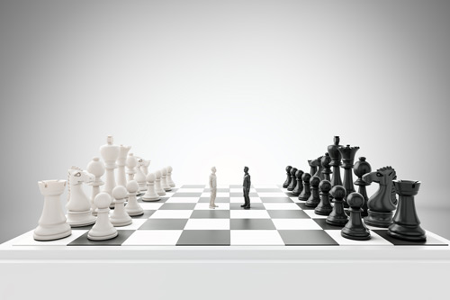 two men standing on a chessboard 
