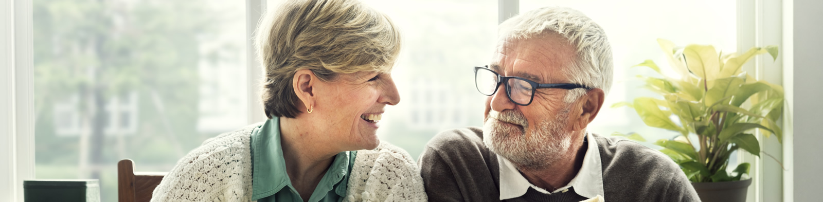 Retired couple enjoying breakfast