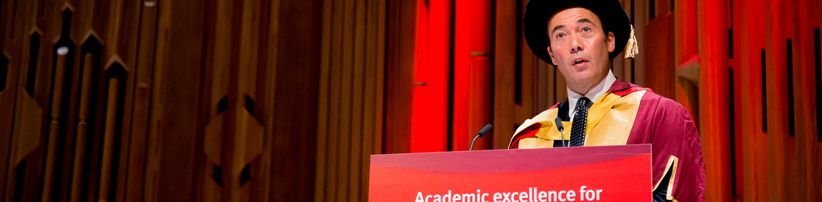 The CEO of Dow Jones, publisher of the Wall Street Journal, William Lewis delivers a speech to graduates at the 2019 Summer Graduations Ceremony at the Barbican Centre in London.
