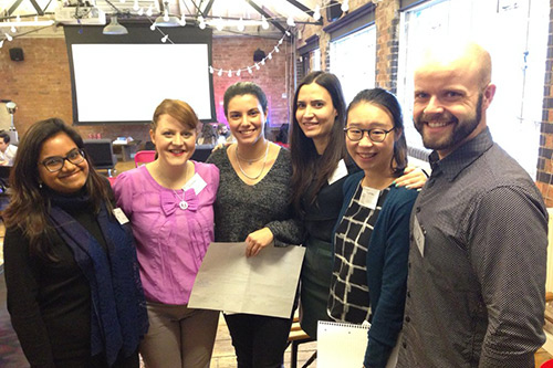 Cara Macklin with guests at the Cass Business School Marketing Innovathon