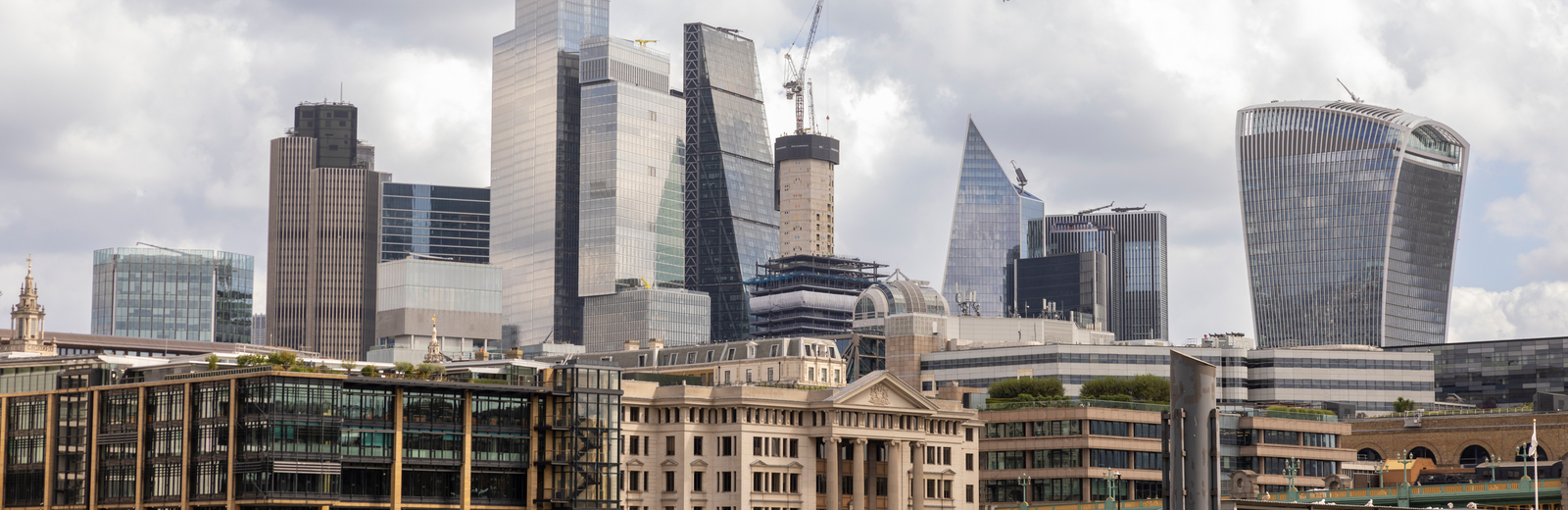 City of London from the Thames - old buildings and skyscrapers