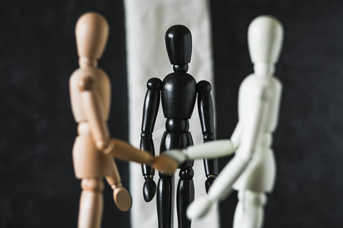 Mannequins shaking hands
