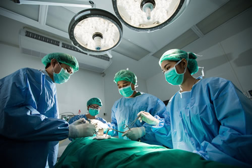 Surgeons operating