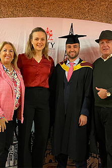 Alvaro and family at graduation