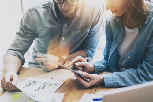 Two people in a business meeting