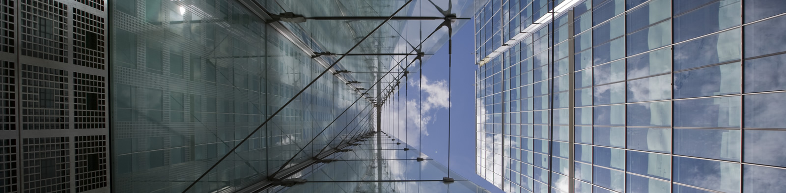 View looking up at a financial district building