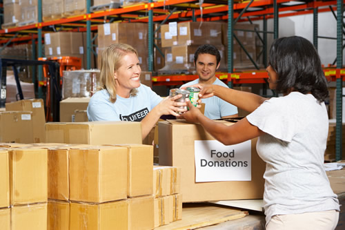 Charity workers handling donations