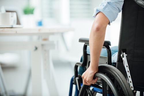 Disabled person working in an office