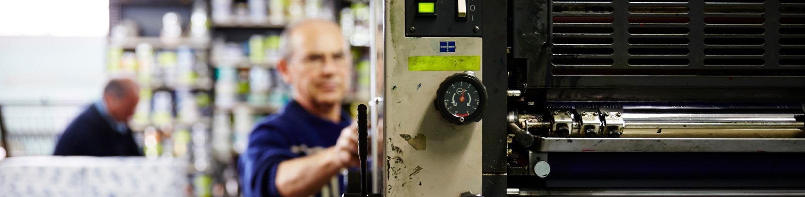Older employee working on an industrial site