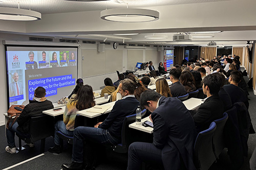 Many students and professionals sitting in a lecture hall for an event for the 20th years anniversary for MSc Quantitative Finance programme