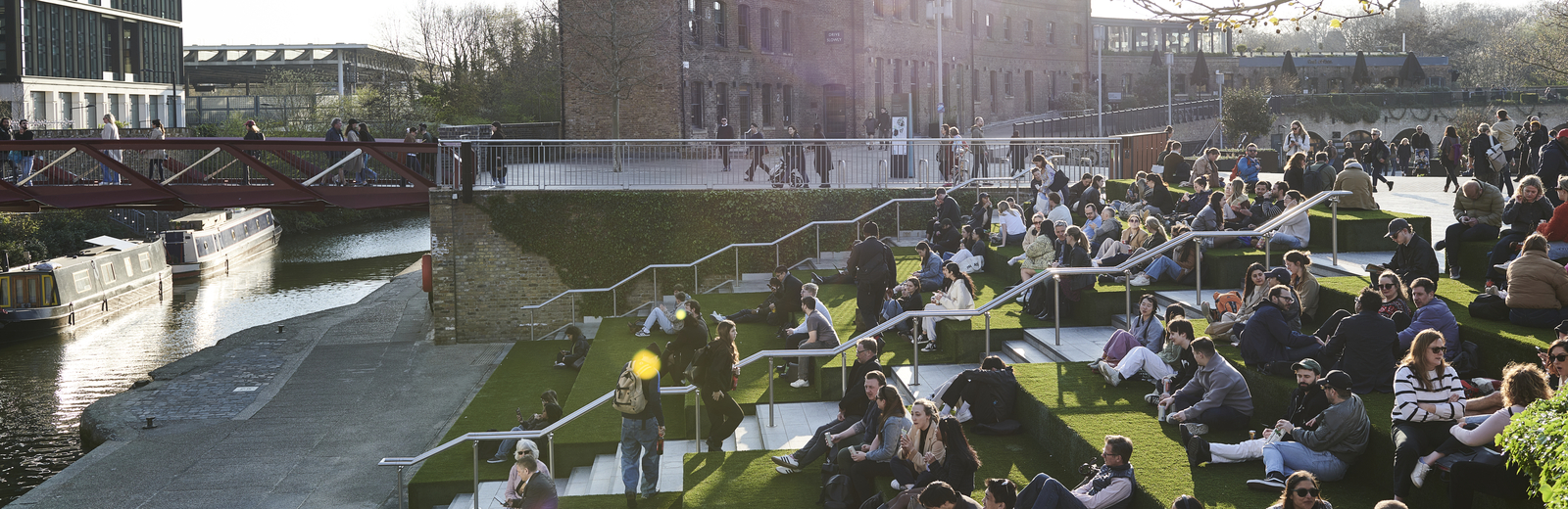 Members of the public enjoying outdoor spaces near Regents Canal.