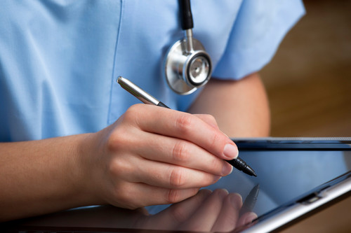 Doctor using a tablet