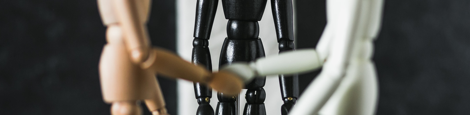 Mannequins shaking hands