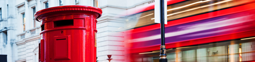 Image of post box and London bus