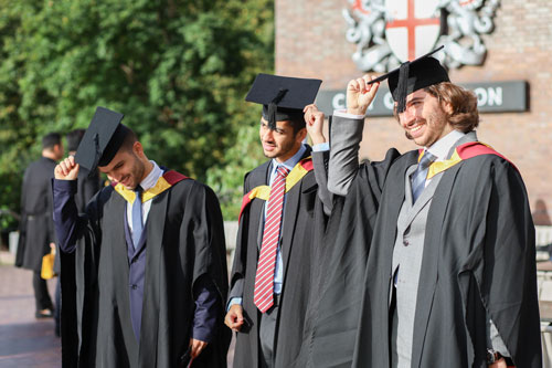 Three Bayes graduates 'doff' their caps Three Bayes graduates 'doff' their caps