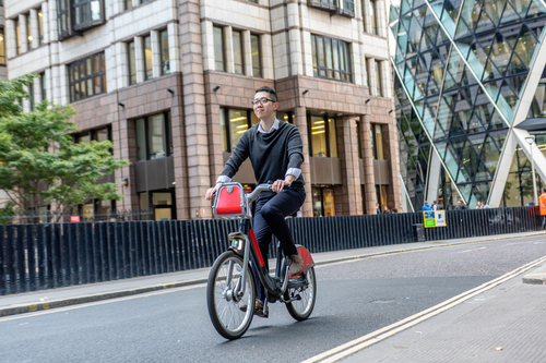 Man biking around the city 