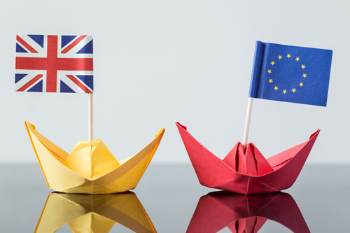 The UK and EU depicted as boats sailing away from each other