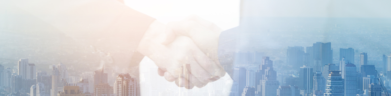 Business people shaking hands over a deal