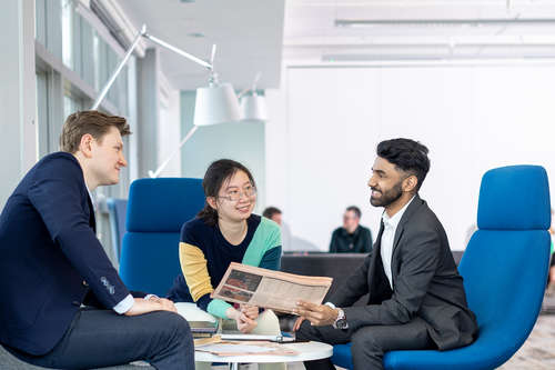 Candidates interacting in waiting area