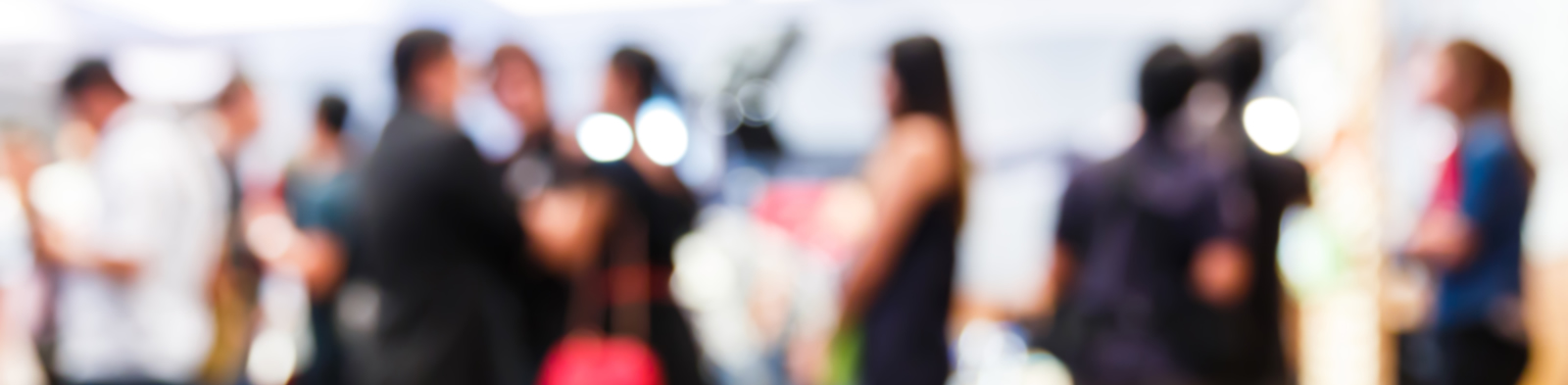 Blurred image of people mingling