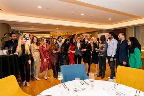 Alicia with her cohort at the Christmas party. 