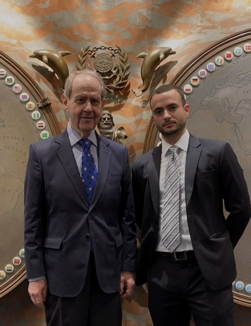 Photo of Lazaros standing next to another gentleman