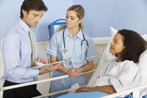 Doctors discuss patient medical history