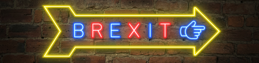 Brexit neon exit sign on brick wall
