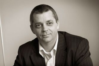 Black and white portrait of Andrew Clare