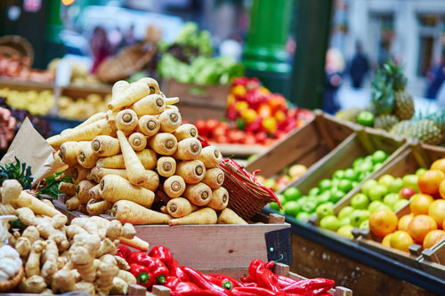 Parsnips and other fruit and veg at a market