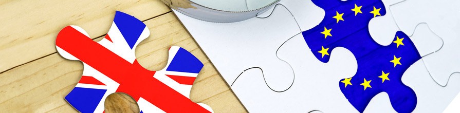 Jigsaw pieces with British and EU flags